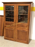 Matched pair of glass door cabinets