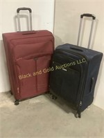Two Large Rolling Suitcases