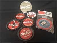 Two Sets of Coca Cola Coasters. All Different