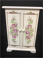 Jewelry Armoire new in box . Measures 12” tall