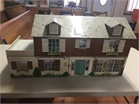 Metal Doll House measures 33” x 12” x 17” with 5
