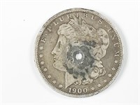 1900-O Morgan silver dollar, hole