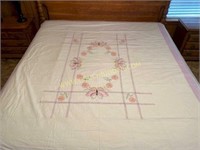 Needlepoint summer bedsheet covering full-size