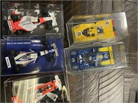 5 Collectible Diecast Cars in Cases