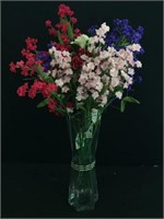 Decorative plastic flowers in a vase