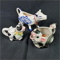 Three Ceramic Cow Creamers