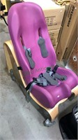Special needs wheelchair - purple rubber seat on a