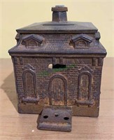 Antique cast-iron building bank, coin still bank,