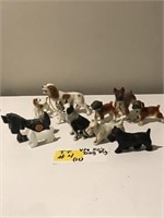 Lot of 11 Dog Figurines Porcelain, Plastic, &