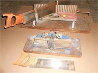 Two miter boxes and saws