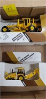 2 John Deere construction toys
