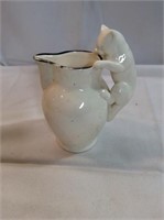 Vintage milk creamer with kitty