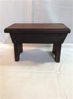 A little wooden stool bench