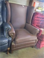 BROWN LEATHER (?) WING CHAIR