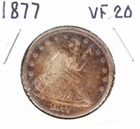 Coin 1877 Seated Liberty Half Dollar In VF