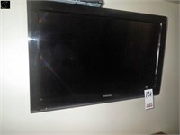 32" Toshiba wall mount television w/ remote