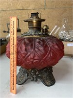 Antique oil lamp/heater with round mantle wick.