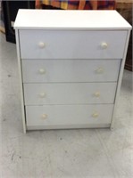 Small white four drawer dresser