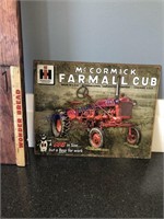 MCCORMICK FARMALL CUB TIN SIGN -