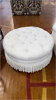 LARGE ROUND UPHOLSTERED OTTOMAN