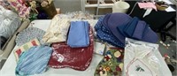 Lot of red, blue table mats, ivory tablecloth