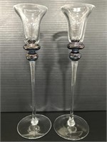 Pair of tall glass candlestick holders