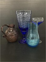 Four pieces of colorful glass