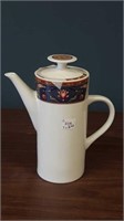 Porcelain teapot 9 in tall by 3.5 in diameter