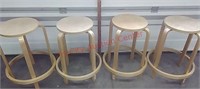 >4-stackable wood stools. Each Stool is 2ft Tall.