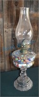 Antique kerosene lamp w/ marbles