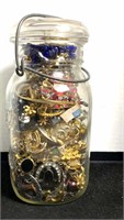 Mason jar full of jewelry