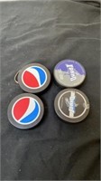 4 hockey pucks