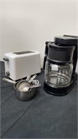 Coffee pot with toaster with measuring cups