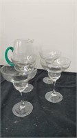 Glass pitcher with 4 margaritas glasses