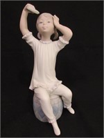 A Lladro Bisque Figurine