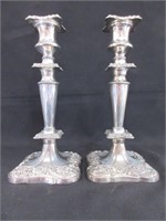 A Pair of Silver Plate Candlesticks