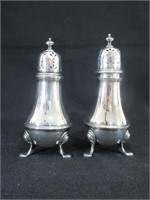 A Pair of Sterling Silver Salt and Pepper Shakers