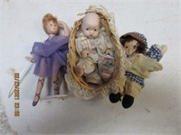 3 small ceramic dolls