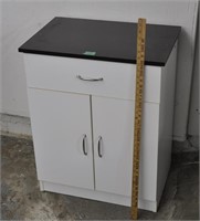 Particle board cabinet,  23.5x16x30