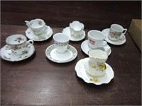 7 SMALL TEA CUPS AND SAUCERS