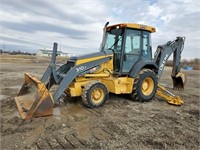 John Deere 310J 4WD Backhoe w/ Encl. Cab 24"