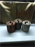 Three vintage kerosene cans
