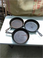 3 old cast iron pans