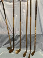 GROUP OF 6 EARLY WOOD HANDLED GOLF CLUBS