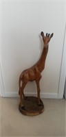 Wooden giraffe statue