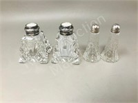 2 sets of small salt & peppers - sterling tops