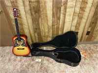1 Guitar- Model K435bwith Case & Quartz Tuner