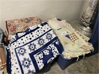 5 Tubs of Quilts, Blankets, and Cushions