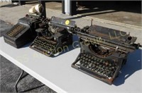 Two Woodstock typewriters and adding machine