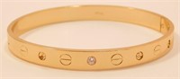 New Designer Inspired Gold Tone Bangle Bracelet.